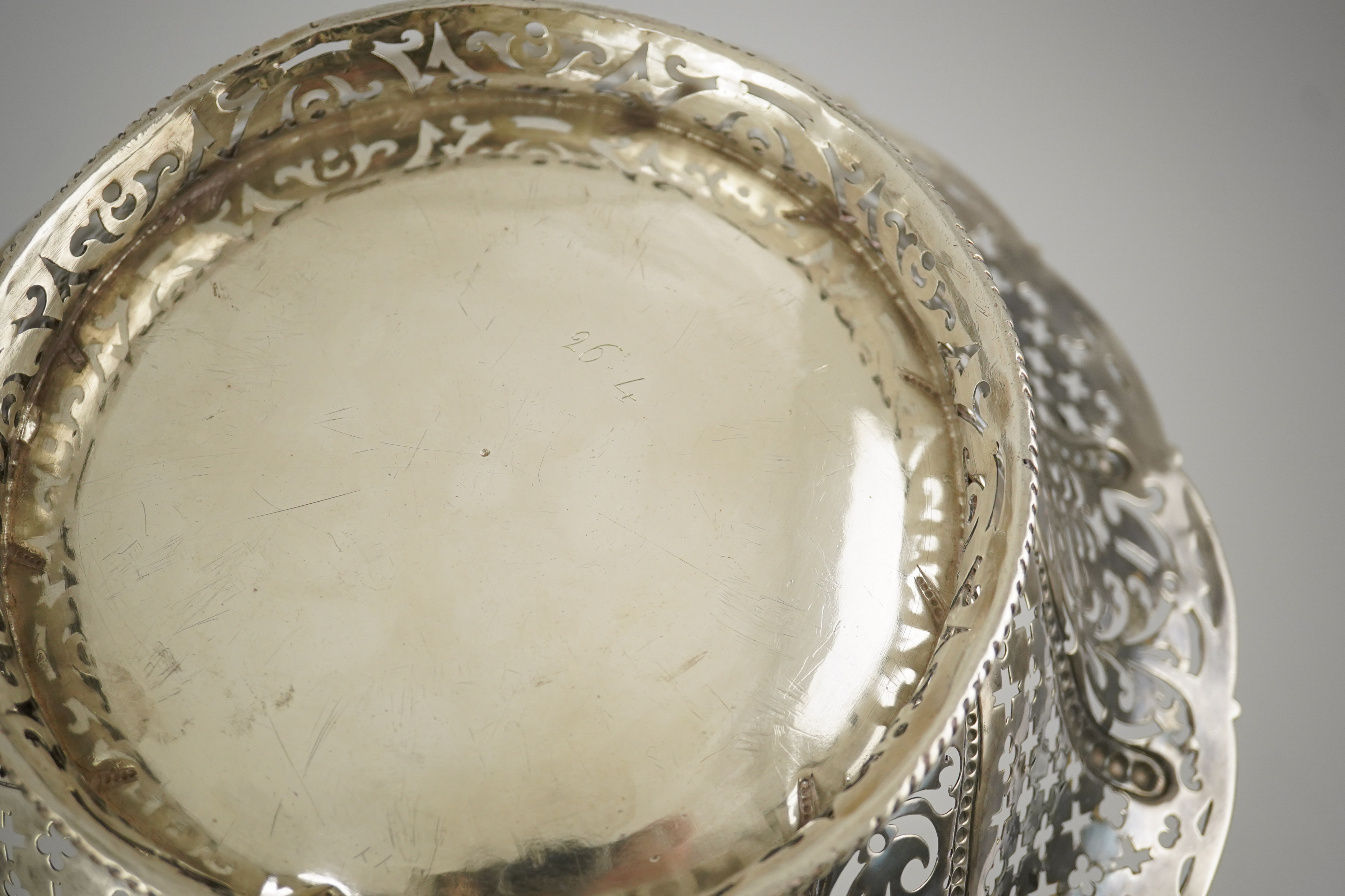 A late George II pierced silver cake basket, by William Plummer?